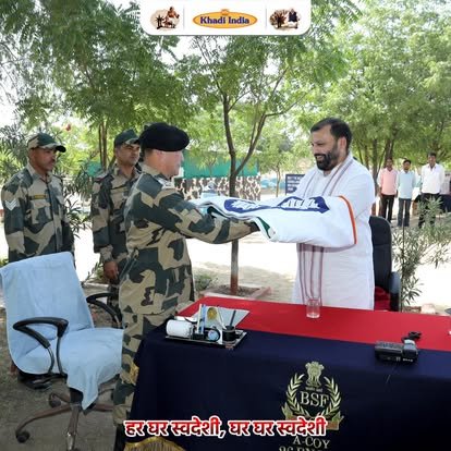 Manoj Goel presenting Khadi to BSF officer